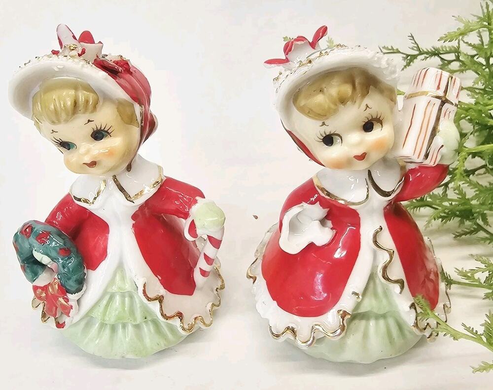 2 TMJ Christmas Girls Bells Figurines Holding Gift Skates Wreath Candy 1950